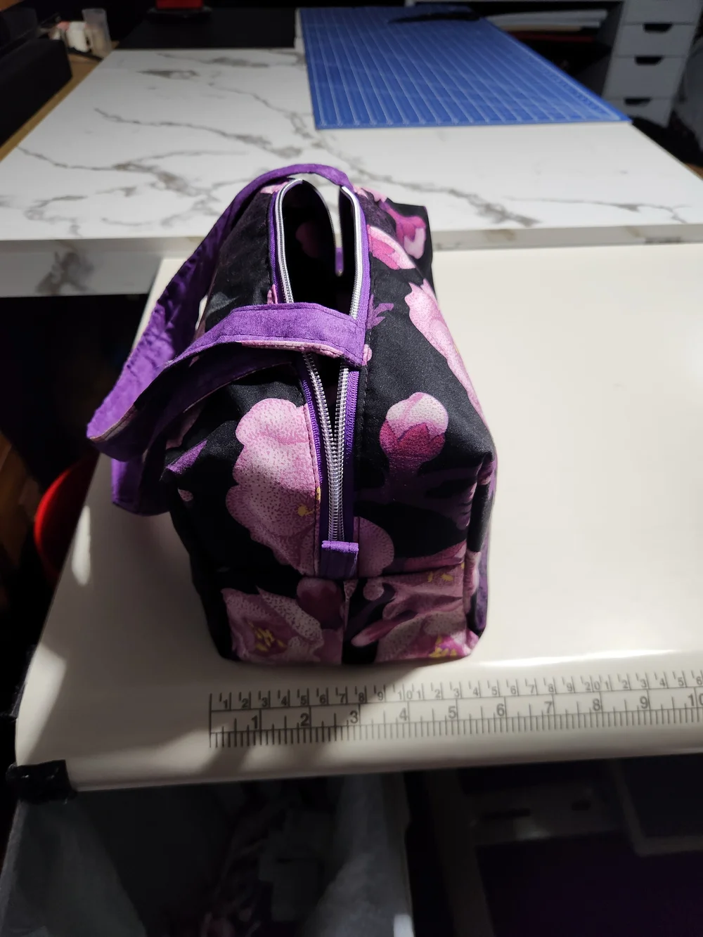 Purple Floral Cosmetic Bag with Black Background